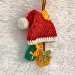 How To Crochet A Festive Santa Hat Keychain That’s Spreads Holiday Charm
