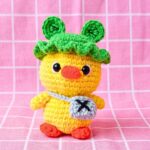 Crochet Duck Amigurumi Pattern with Frog Hat and Sling Bag